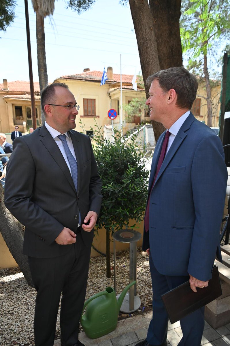 UN_CYPRUS's tweet photo. Top @UN official in #Cyprus Colin Stewart, addressed the anniversary of the bi-communal political party dialogue hosted by the #Slovak Embassy in Cyprus at the Ledra Palace Hotel in the @UN #bufferzone. 
He thanked #Slovakia 🇸🇰 for its important contribution to the peace process and to #UNFICYP.
Stewart and guest of honor State Secretary Rastislav Chovanec watered symbolically the Tree of Peace.
#A4P #UNCyprusTalks @UNDPPA