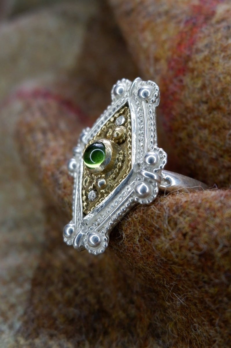 caledonianforge's tweet image. Our "Ancient Rings of Scotland" collection is now here!
First up is The Iona Ring. Based on a bezel from Iona in the @nationalmuseumsscotland - Filigree sterling silver with gold plating and a glass cabochon.