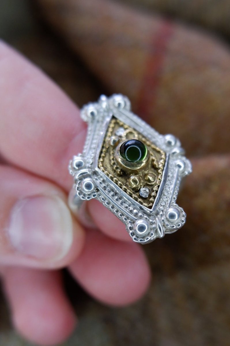 caledonianforge's tweet image. Our "Ancient Rings of Scotland" collection is now here!
First up is The Iona Ring. Based on a bezel from Iona in the @nationalmuseumsscotland - Filigree sterling silver with gold plating and a glass cabochon.