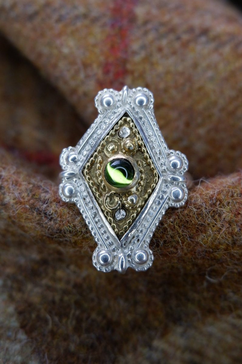 caledonianforge's tweet image. Our "Ancient Rings of Scotland" collection is now here!
First up is The Iona Ring. Based on a bezel from Iona in the @nationalmuseumsscotland - Filigree sterling silver with gold plating and a glass cabochon.