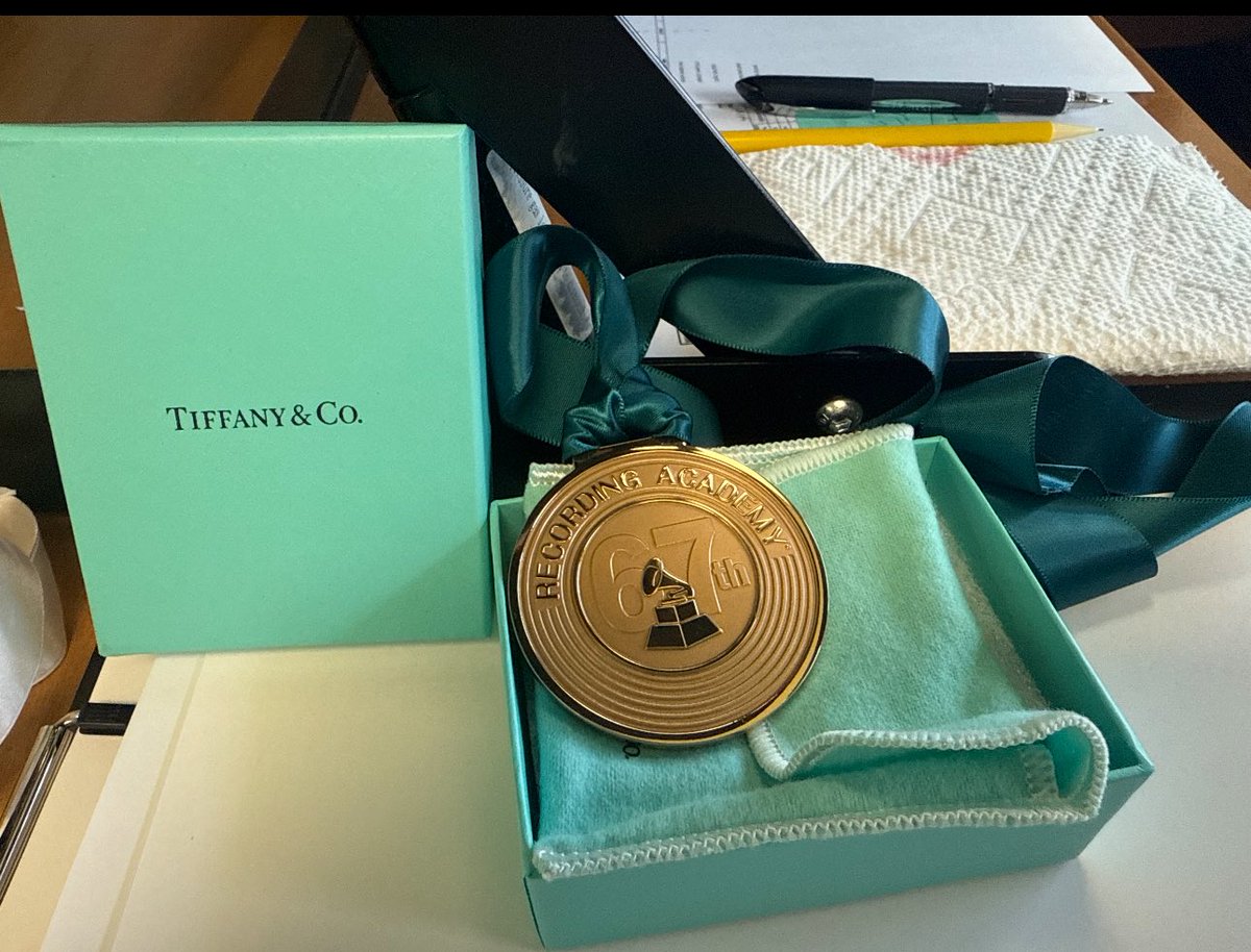 JBONAMASSA's tweet photo. My fourth loser medallion arrived at the office today.  One more and I can make a really bitchin' wind chime out of them. 😎👍😂 https://t.co/0DVmlZiMbs