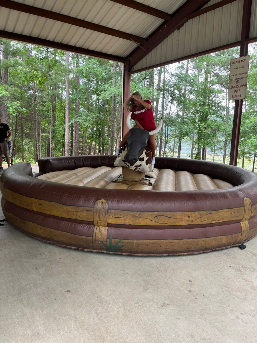 Seniors Brayden Walker and Peyton Berry joust in the inflatable arena during the 2025 senior class picnic. Seniors participated in many different activities including bull riding, an inflatable obstacle course, fishing, tennis, and more. 📸 Addison M.