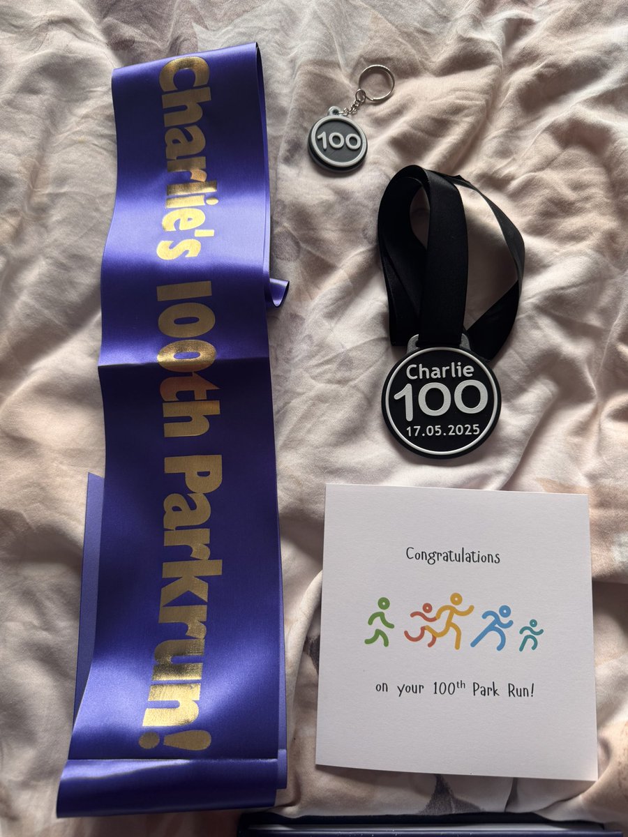 My girlfriend just came round with a sash, medal, keyring and card for my 100th parkrun tomorrow 😭