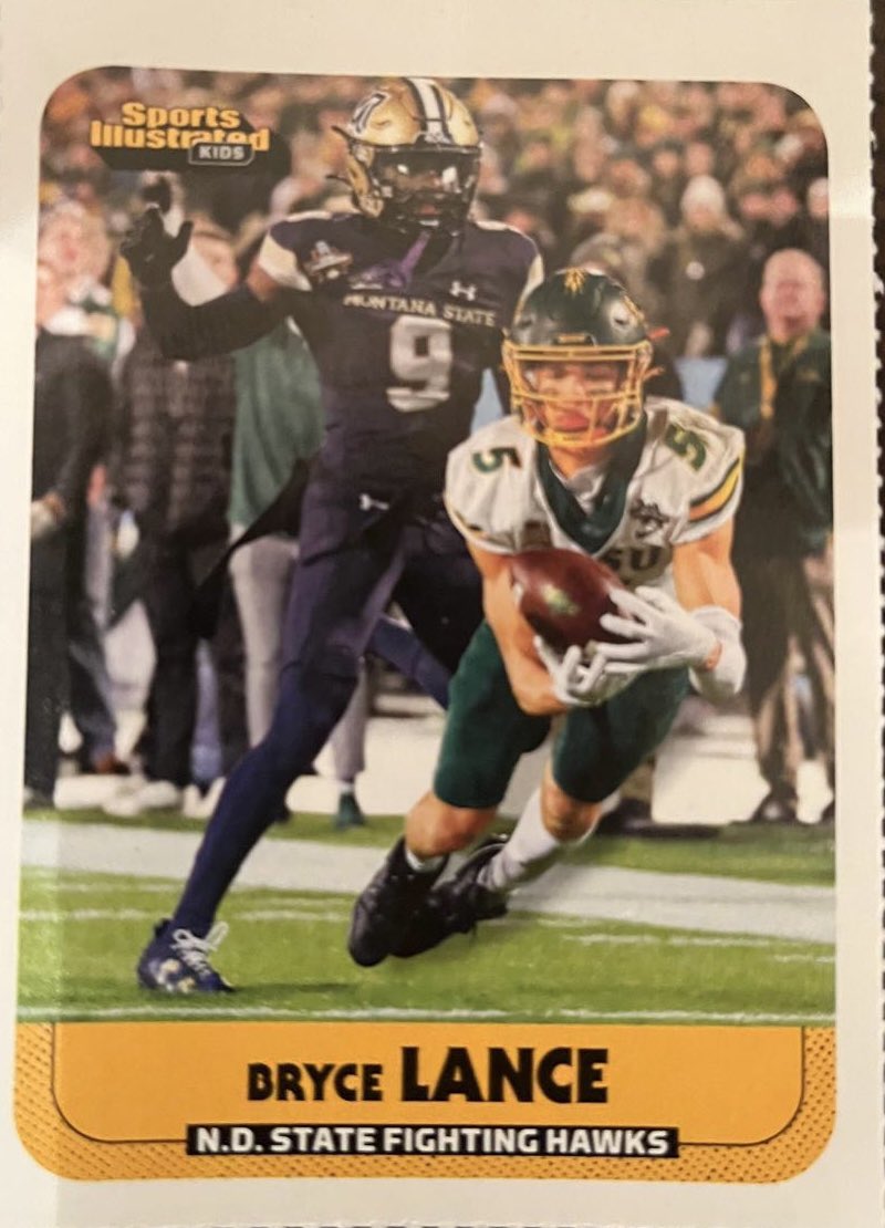 ThomasONeill47's tweet photo. @SInow @BryceLance09 Hey SI - take a look at Bryce’s card in SI4kids.  It says ND Fighting Hawks - that’s the rival school!  Hope you didn’t list anybody for the Michigan Buckeyes.  As an alumn I call for a printed retraction and apology for this egregious error!  🤣. The horror! https://t.co/d9lFpWy2Wa