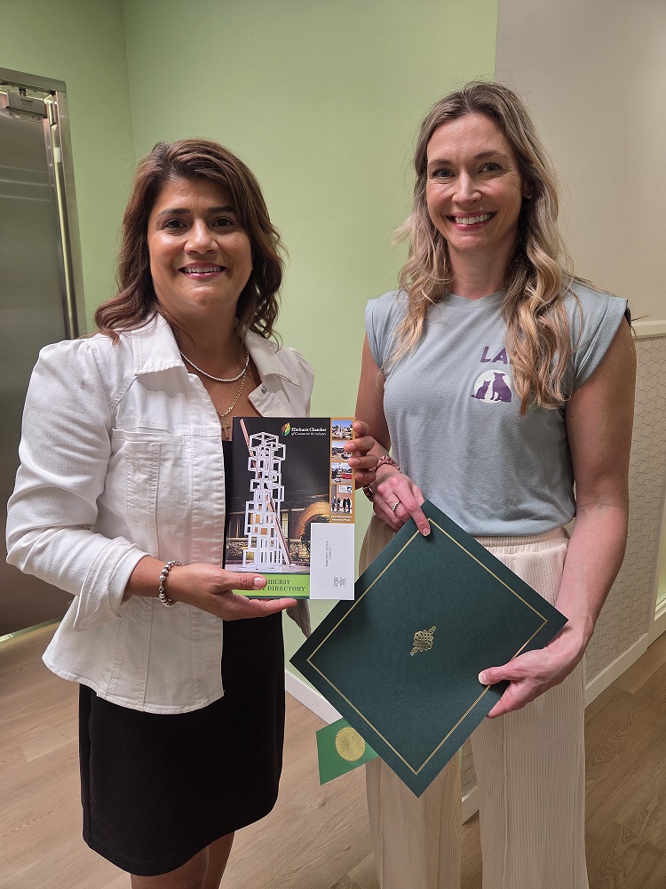 Chamber Ambassador and members of the ECCI Board of Directors join Co-Owners Dr. Sarah Baker and Dr. Alex Weber and Multi-Site Manager Kali Rada of Lane Veterinary for a Grand Opening ribbon cutting of their new 311 North York Street clinic.
