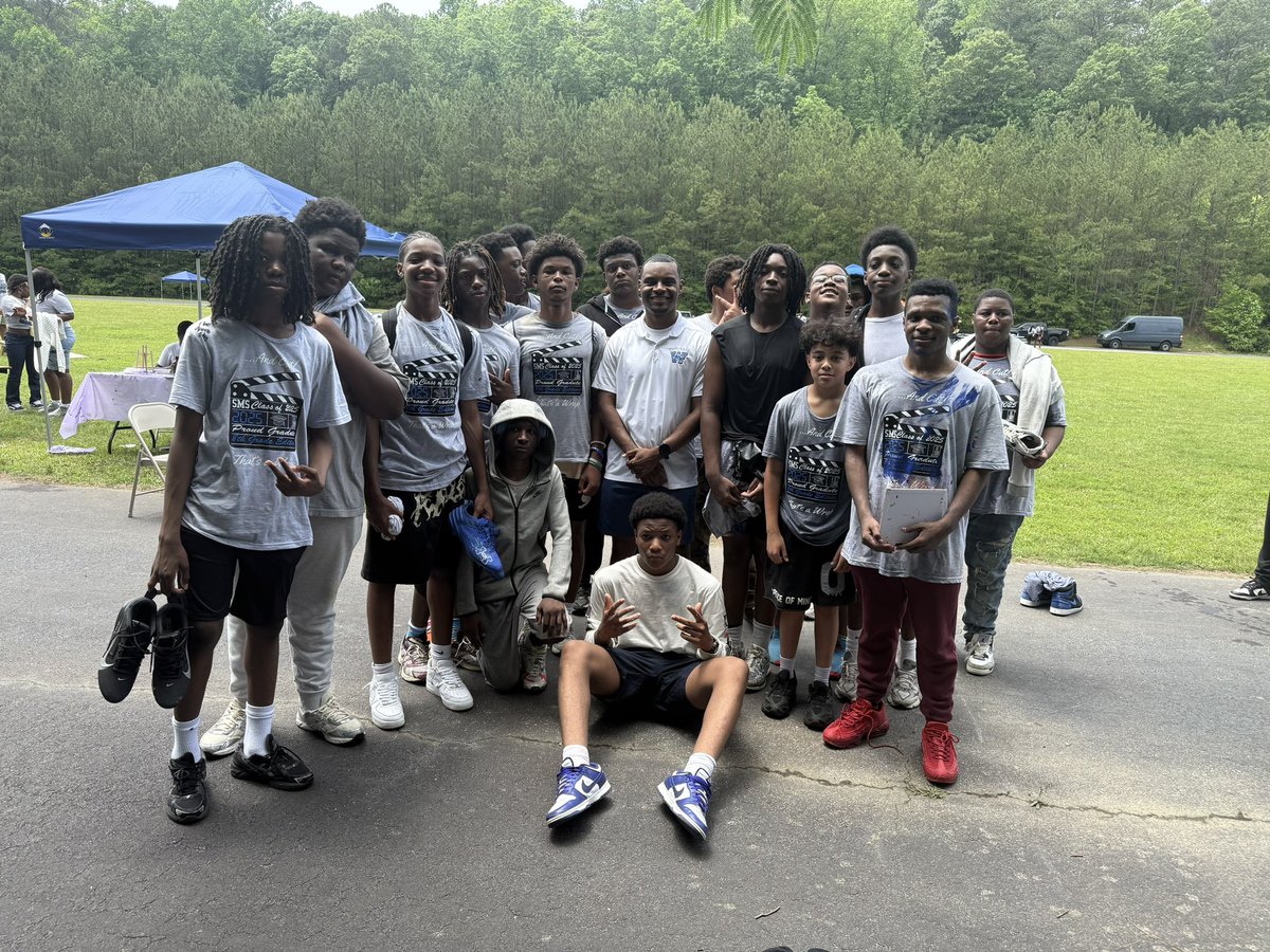 Coach Mitchell with our future Lions at Sandtown Middle School’s 8th grade Field Day