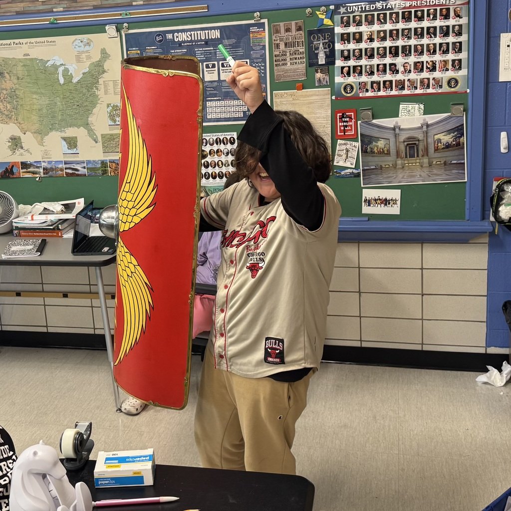 Our 6th graders stepped into the shoes of ancient Roman soldiers today as they wielded a scutum—the iconic Roman shield!
