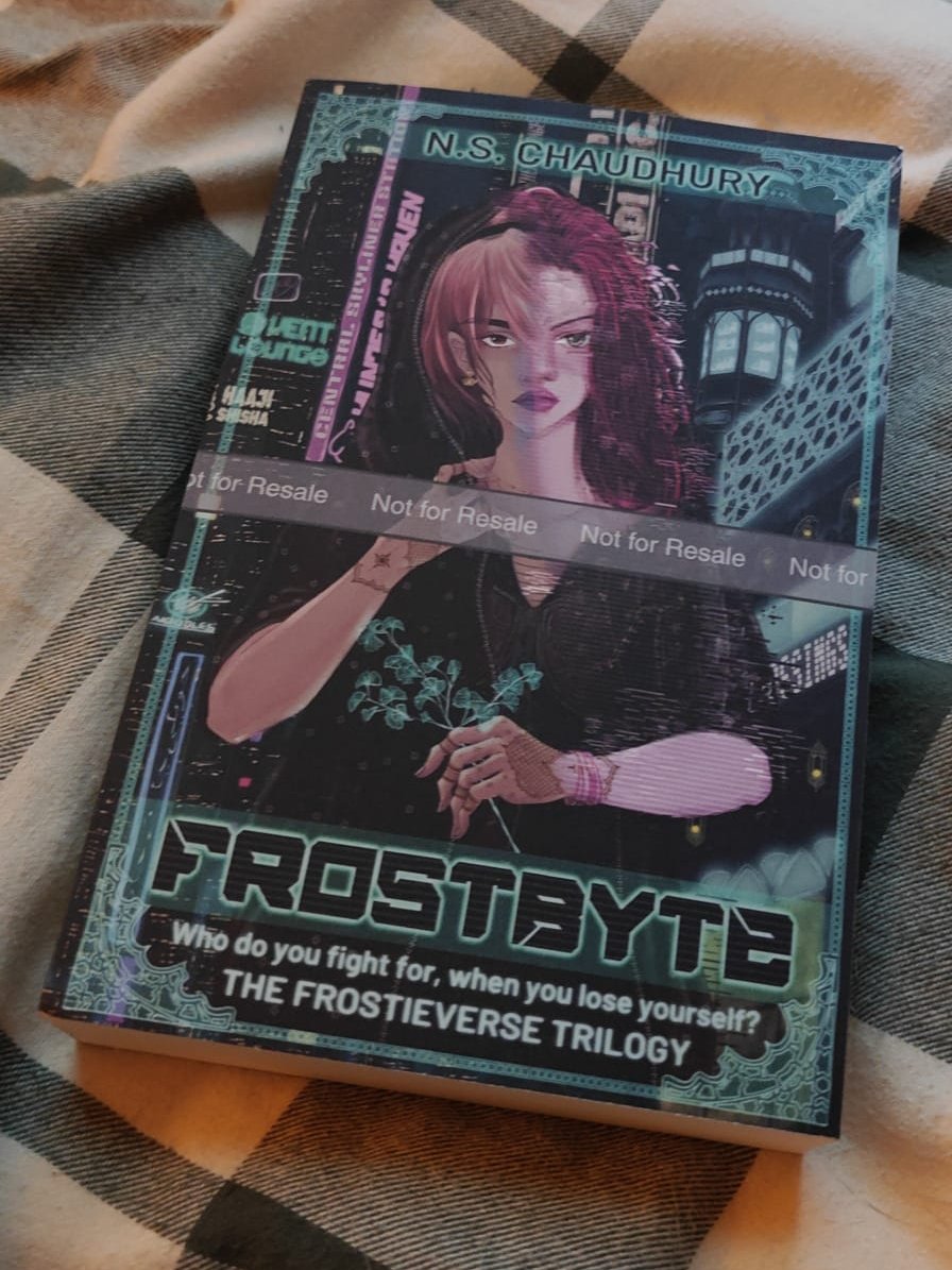 nimmiwrites's tweet photo. OMG OMG OMG! The paperback proof for FrostByte finally arrived at my bestie's place &amp; it looks so good!!! 
(I wish I could've held it in my own hands but 'zon doesn't ship proofs to my country 😭 so this was the next best thing but I'm so excited!) 
Loookkk!!!
Isn't she pretty? https://t.co/RJCuZ6xlMt