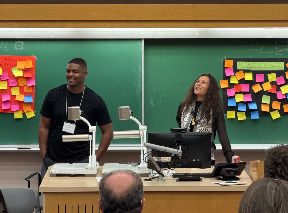 Me and Randy in laughter, friendship and resistance during our keynote at the Transforming Justice conference.