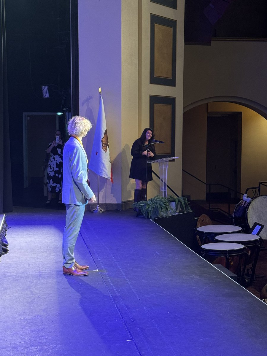 Miss Privitt returns to the stage to pass out another Golden Hawk for science, this one to Jack Sexton for Physical Science! Congrats, Jack!