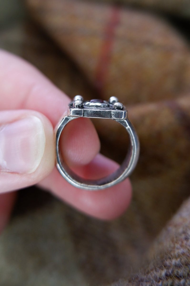 caledonianforge's tweet image. Next in the "Ancient Rings of Scotland" collection. The Dundurn Pictish ring. Based on one of the mould fragments of Dundurn: likely for a pin which I also have made, but I think it also has similarities with the Burghead ring so I turned the centre into a setting for a garnet.