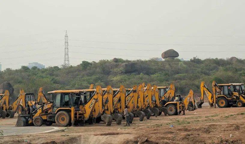 Everyone’s seen this viral photo of JCBs lined up at HCU. Two big developments around it:

1. The Forest Department seized 3 JCBs and fined TGIIC ₹5 lakh after it found 125 non-exempted trees were illegally felled (in addition to 1,399 exempted ones).

2.  The Supreme Court,
