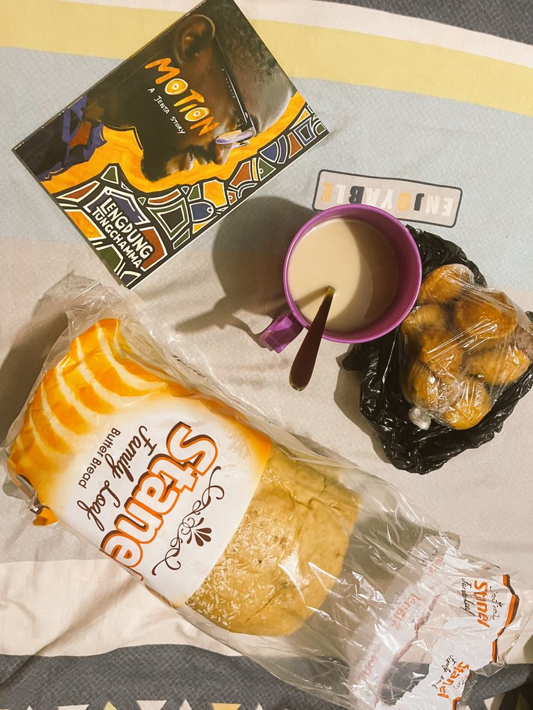 MarceloShehu's tweet photo. Nothing beats a Rainy Saturday in Jos, Nepa Light, Hot Akara and A @StanelJos Bread to go. I am happy to have Motion: A Jenta story by Lengdung Tungchamma as my 10th book for the year... @JentaReads! A review coming soon... 😊 https://t.co/O2YxTV61SV