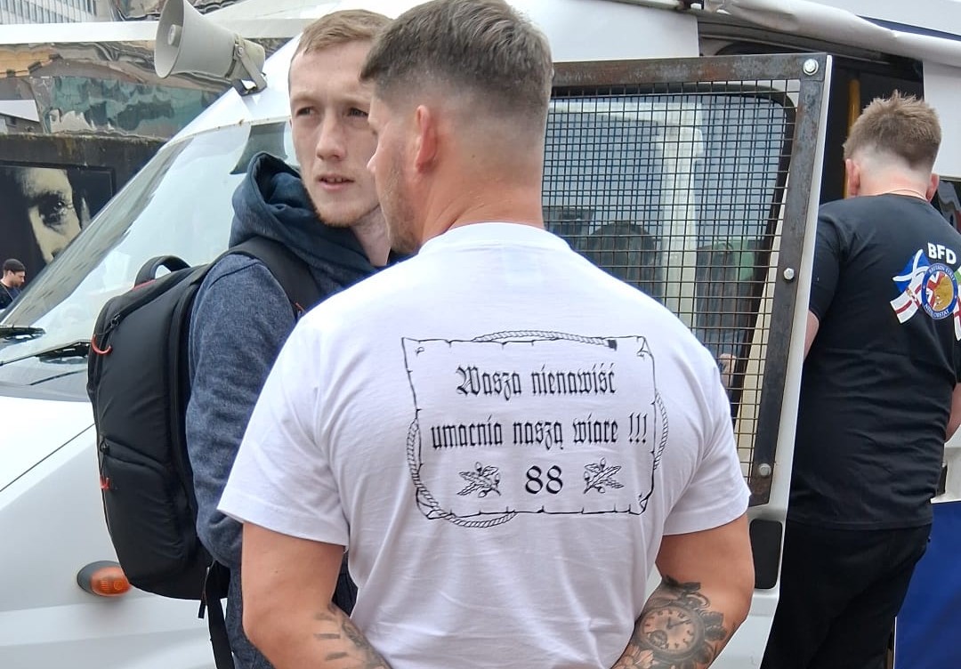 @Searchlightmagazine (@searchlight_mag) on Twitter photo Oh, dear. Bit of a giveaway in Birmingham. James Harvey of the laughably named Students Against Tyranny with a chum wearing his true affiliation proudly.
(New readers: in the nazi lexicon, 88 stands for Heil Hitler)
<a href="/uaf/">Unite Against Fascism</a> <a href="/AntiRacismDay/">Stand Up To Racism</a> Oh, dear. Bit of a giveaway in Birmingham. James Harvey of the laughably named Students Against Tyranny with a chum wearing his true affiliation proudly.
(New readers: in the nazi lexicon, 88 stands for Heil Hitler)
<a href="/uaf/">Unite Against Fascism</a> <a href="/AntiRacismDay/">Stand Up To Racism</a>