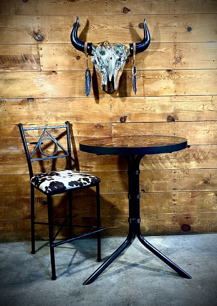Does the perfect high table exist? We gave it our best shot at Twisted Tree Forge. A cedar flower, in laid with turquoise in a black resin table top, with custom metal base. Available, dm for info

#Dont_Say_You_Love_Me  
#blacksmithmaster #resinart