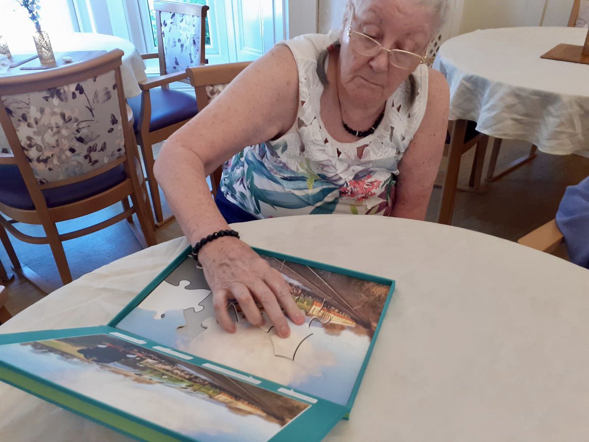 OrielCareHome's tweet photo. The ladies of the Jigsaw Club gathered around the table for an afternoon of activities earlier this week, puzzling away while enjoying a cheerful sing-song! 🧩🎶

#Jigsaw puzzles are a fun way to keep an ageing mind active, support memory, and encourage teamwork! ��

#carehome https://t.co/EEdjlvp9I0