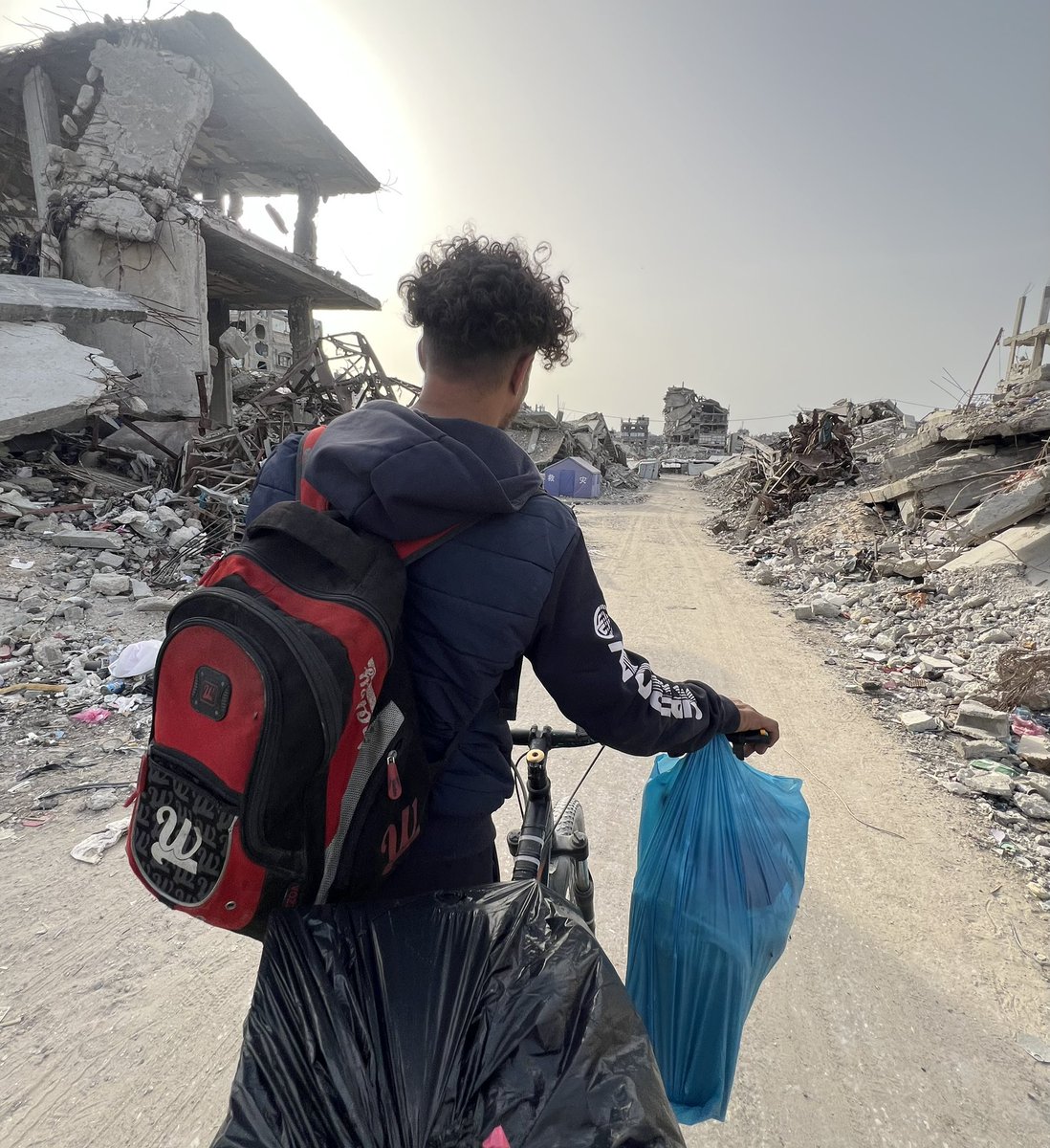 This photo was taken while I was fleeing my neighborhood due to Israeli airstrikes. It’s not just a moment, it’s a memory of fear, loss, and the struggle to survive. Like many others, I had to leave everything behind in search of safety.

Please keep #Gaza in your thoughts and