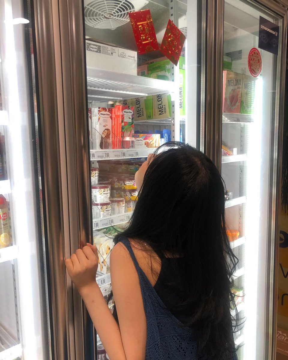 jiaheon's tweet photo. Gazing thoughtfully at the frozen treats behind the glass door, the soft light highlights her anticipation as she decides what to pick. https://t.co/jogOeh4jHc