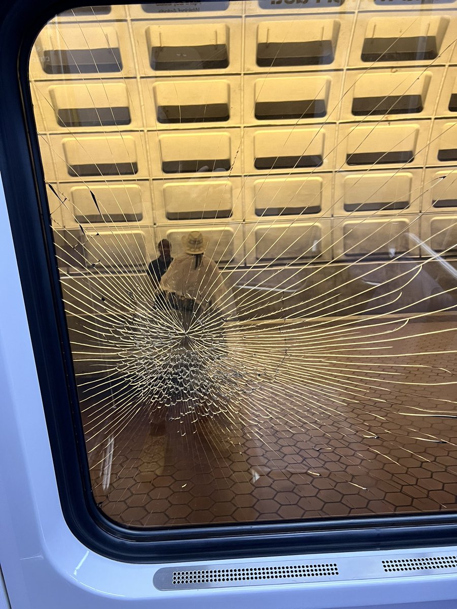 KeithStanleyEmc's tweet photo. @wmata I am on an orange line train to Vienna and there are 7 shattered windows on this car! https://t.co/KESfctgsoF