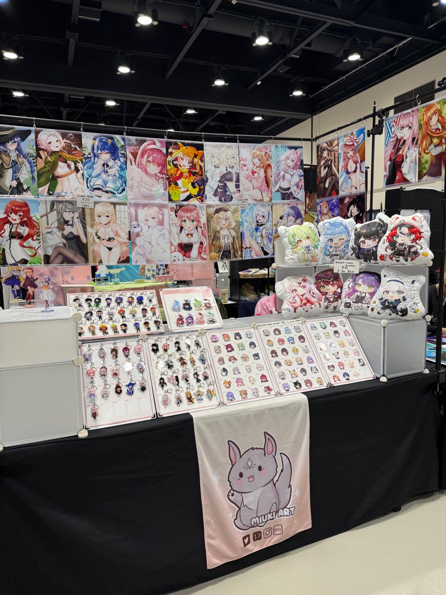 ArtsMiuki's tweet photo. ✨ Day 2 of Otafest has officially started!! ✨ Come to H49 in the Artist Alley to check out my new Fubuki and Baelz cushions/charms! #otafest #otafest2025 #otafestartistalley #artistalley https://t.co/RKRlmlM1sC
