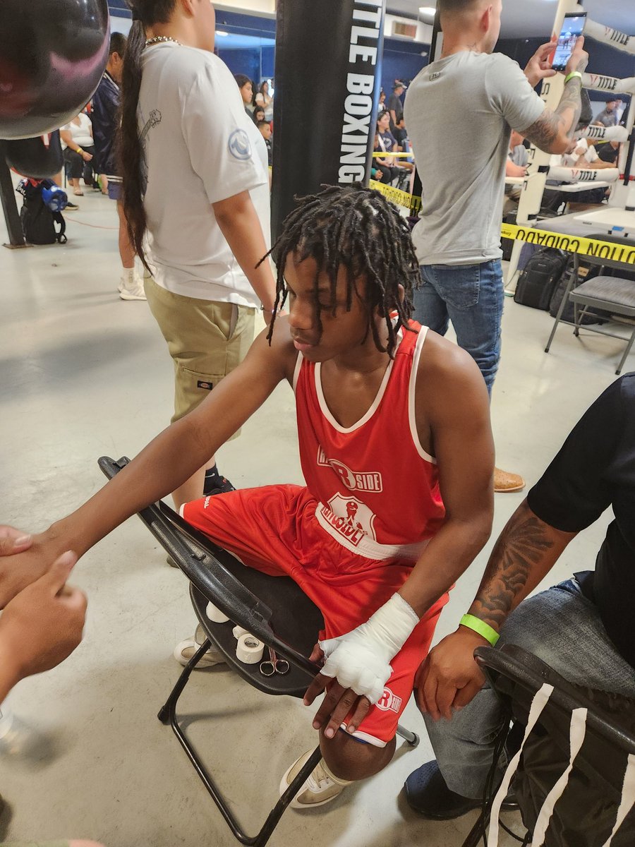 Jamarion getting his hands wrapped for his bout 16, at Ring of Hope's the All Smoke in the South tournament.