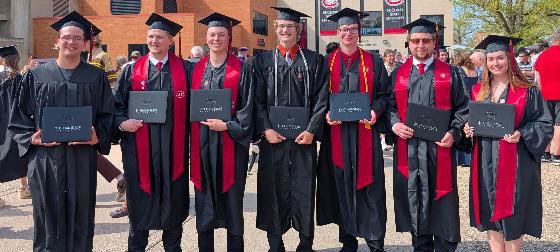 It’s time for our first graduation celebration! Today, we have the St. Cloud State University graduates. We are so proud of you! Left to right: Sonny Kremin, Grant Peterson, Carson Pederson, Miles Harmala, Josiah Melke, Ewan Newbold, Ashley Turkowski. Not pictured: Tim Wittrock