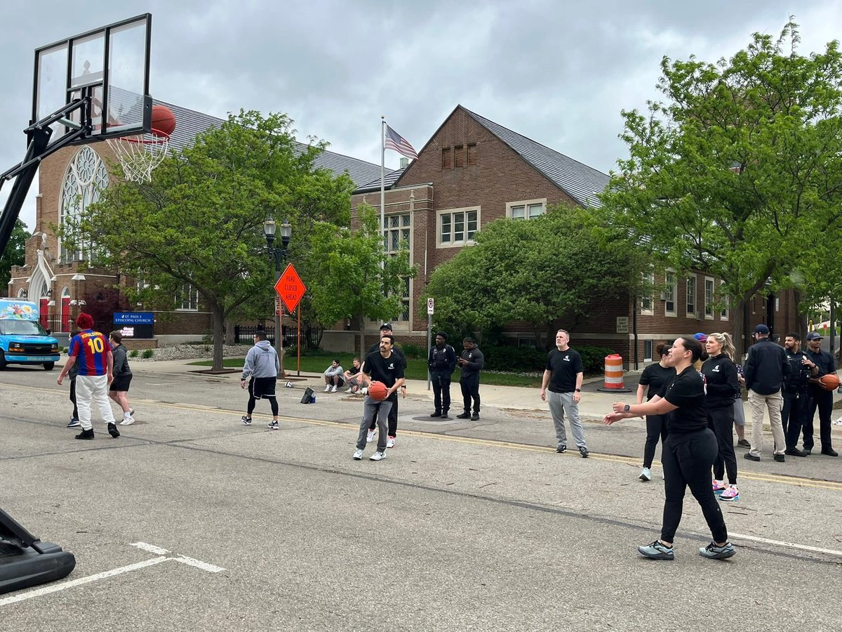 Rain couldn't stop the fun at today's Lansing Basketball Cop Day! Families came out to shoot hoops with MSU police officers and our friends from Lansing PD, East Lansing, Michigan State Police, and Ingham County. 🏀👮‍♂️ The community had a blast playing ball and connecting with all