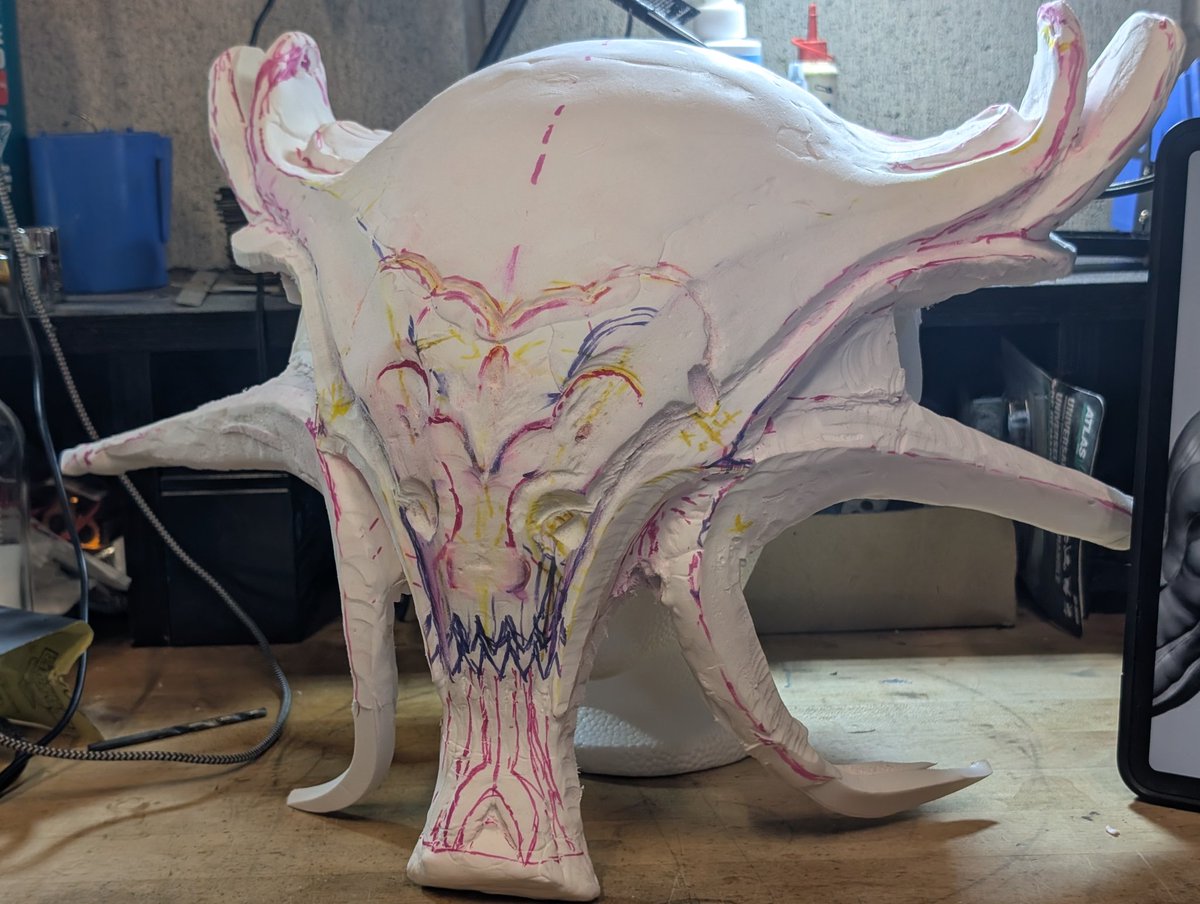 Shkelliton's tweet photo. So much trimming to do but going ok! I have no idea how to fill portions in without putting more foam in but I'm sure I will learn (hopefully in time to take to tennocon lol) #Warframe #warframeart https://t.co/BAzQdRDtQD