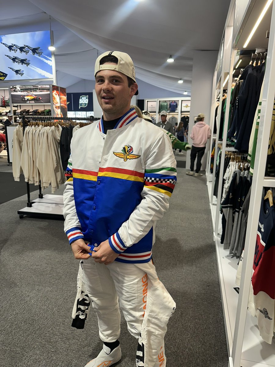 JennaFryer's tweet image. Fans have been raving about the #Indy500 merch, and that includes @PatricioOWard, who saw me wearing one of the jackets as he came off track. So he had me take him to the merch tent while in his firesuit, purchased the jacket, drew a crowd, signed merch in the tent and posed for…