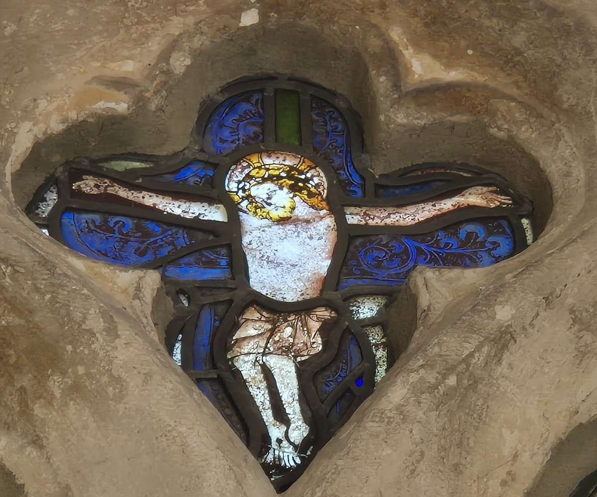 AlabasterMiss's tweet image. St Peter's has one fabulous window of #medieval #StainedGlassSunday: St Cecilia with her organ on the left, St Catherine with her dartboardish wheel on the right, a crucifixion at the top. Delightful little acorns at the top of the saints windows!