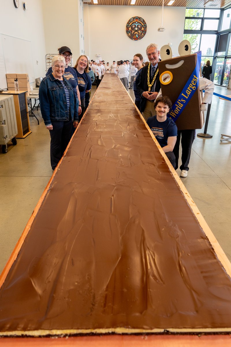 Congratulations Vancouver Island University students for creating the world's biggest #Nanaimo Bar right here at home! (1100 pounds!) In honour of this achievement, Mayor Leonard Krog and the City of Nanaimo also proclaimed today, May 17, 2025, as Nanaimo Bar Day! Sweet! #YCD