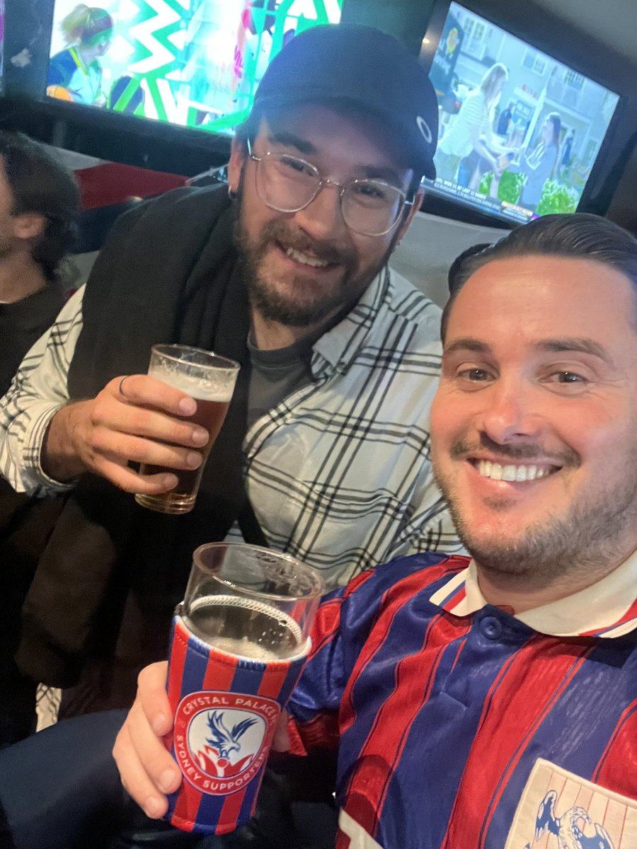 RossiParish01's tweet photo. Wasn’t at Wembley, but had the next best thing with the Palace boys in Sydney 🇦🇺🔴🔵  

Packed pub, limbs everywhere, emotional rollercoaster. 🏆

Henderson. Eze. Sarr. Mateta. Heroes. 🦅🏆🔥 #CPFC https://t.co/8bm5w5QiGY