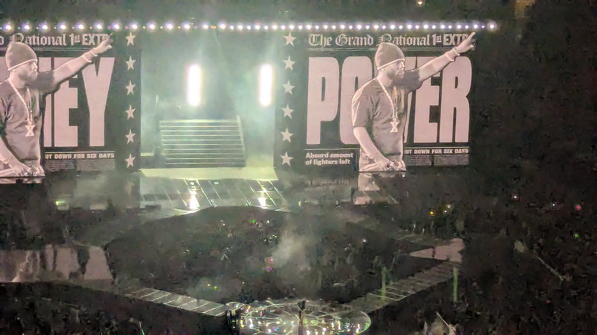 Kendrick outside in pelting rain