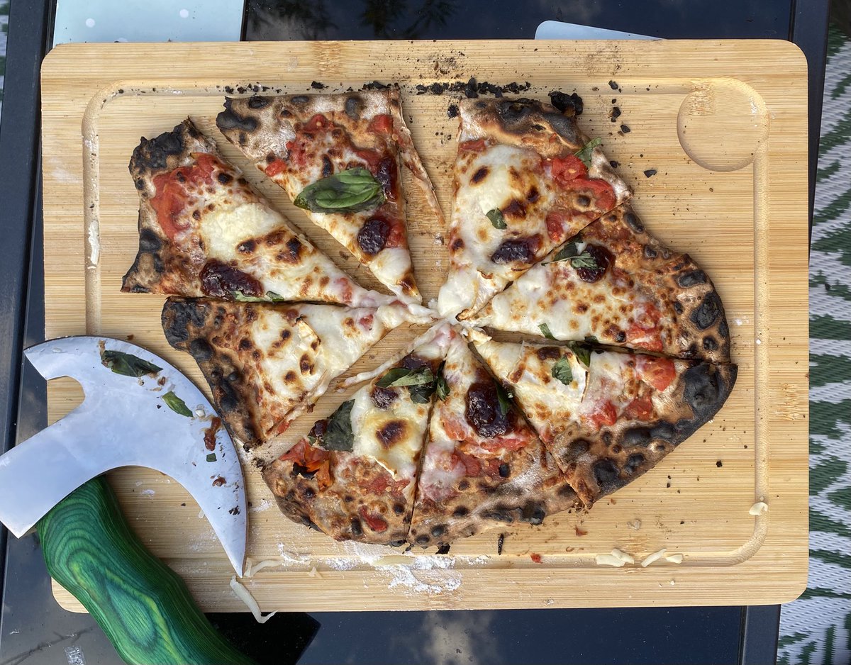silverbackmpr's tweet image. First time in a long time Pizza oven out and making great pizzas. I forgot that each pizza only takes about 90 second so they are a bit ‘caramelised’ at the edges 😂 #oonipizzaoven #ooni