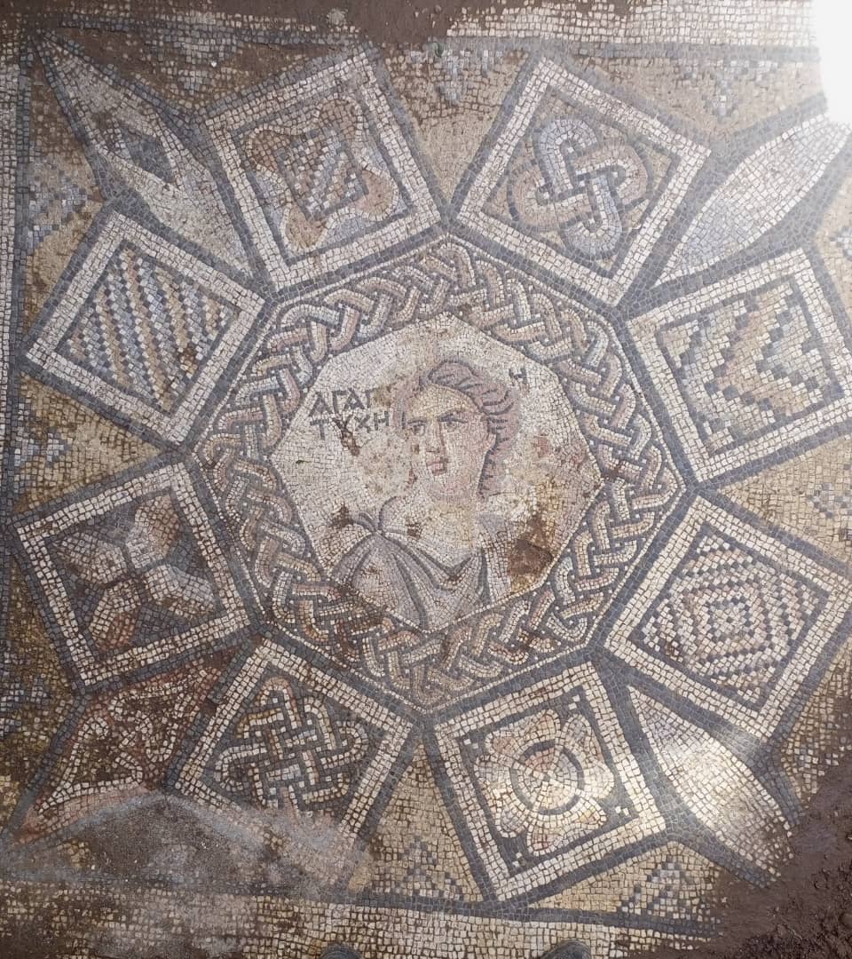 Syria: someone digging a well in his house discovered a mosaic 2.5 m below the ground, depicting the Greek goddess Tyche (luck) and a dedication to love (ΑΓΑΠΗ).
Discovery was made in the village of mariameen (~27 km NW of Homs).