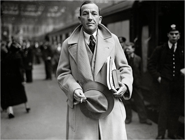 Noël Coward at Waterloo Station in London, 1937.