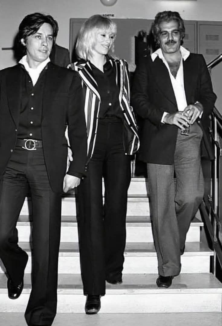 Alain Delon, Mireille Darc, and Omar Sharif at the height of '70s fashion.