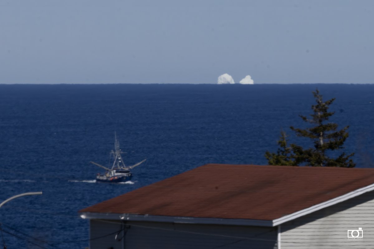 Alick Tsui (@positively4ever) on Twitter photo Huge berg lingering outside St. John's. Just need North Easterlies to bring it in closer. Photo: May 17 2025. #iceberg #lovestjohns <a href="/NLtweets/">NewfoundlandLabrador</a> <a href="/CityofStJohnsNF/">CityofStJohns</a> <a href="/DestinationCAN/">Destination Canada</a> <a href="/CBCNL/">CBC Newfoundland and Labrador</a> #northatlantic #cangeo Huge berg lingering outside St. John's. Just need North Easterlies to bring it in closer. Photo: May 17 2025. #iceberg #lovestjohns <a href="/NLtweets/">NewfoundlandLabrador</a> <a href="/CityofStJohnsNF/">CityofStJohns</a> <a href="/DestinationCAN/">Destination Canada</a> <a href="/CBCNL/">CBC Newfoundland and Labrador</a> #northatlantic #cangeo