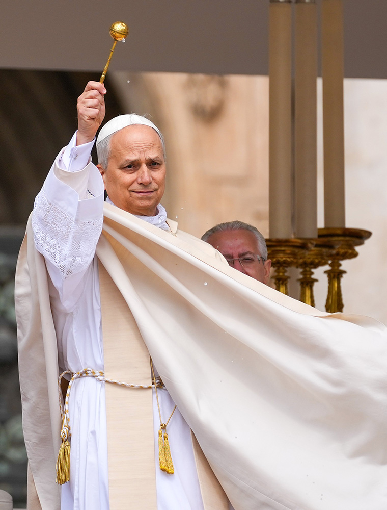 Pope Leo XIV blesses the faithful in St Peter's Square at his installation Mass today, where he received his woollen pallium and fisherman's ring, the symbols of office👼 (CNS photo/Lola Gomez)