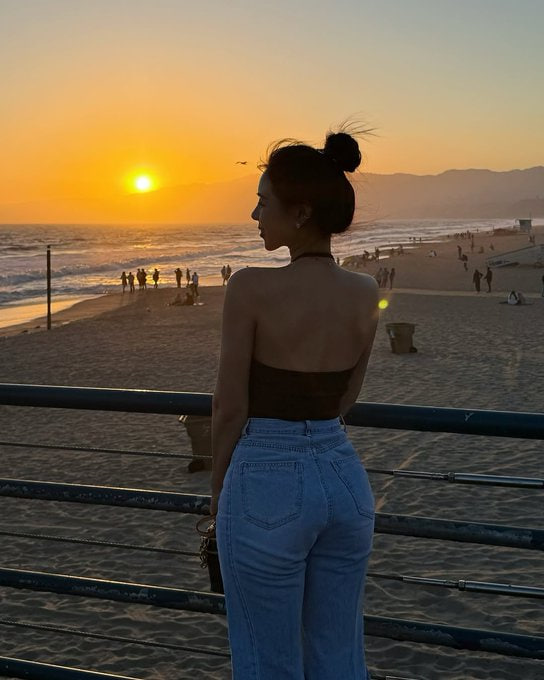 The sea in the evening is magnificent, mysterious and beautiful. As the sun sets, the sky is still burning with an orange sunset glow.