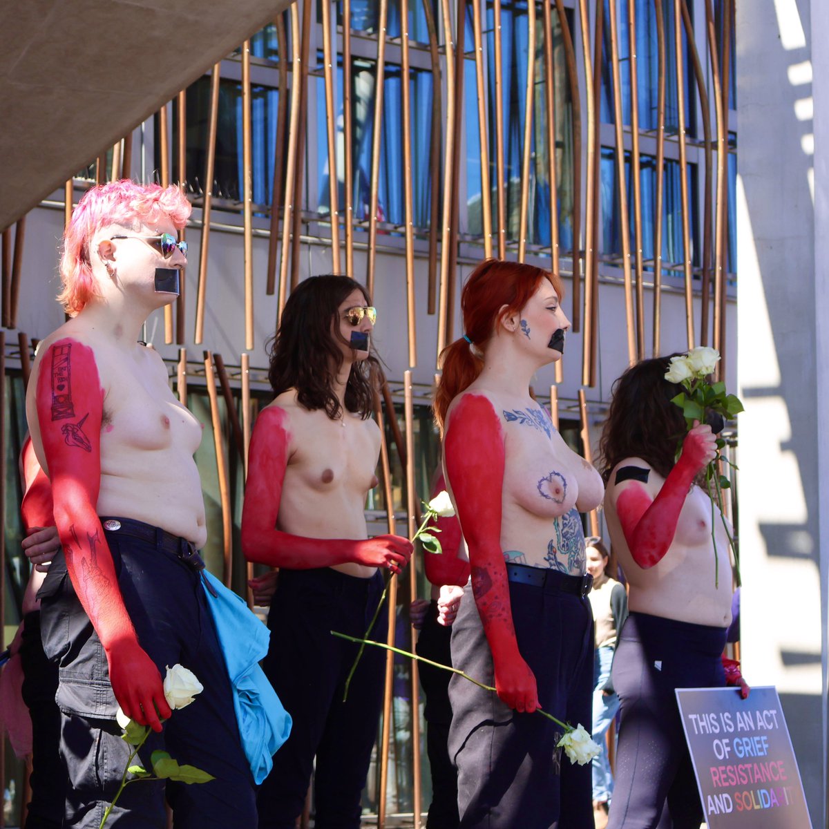 sugarGSP's tweet photo. Yesterday a group of trans women protested topless to condemn the UK Supreme Court’s ruling and highlight the hypocrisy of the subsequent EHRC interim guidance which aims to segregate trans women. 

Most media outlets censored the images which we feel defeats the purpose. 

 You can read the press release here - 

https://t.co/F8Sx3lc2d9

Thank you to @PinkNews and @ScotNational for covering the story as it broke.
