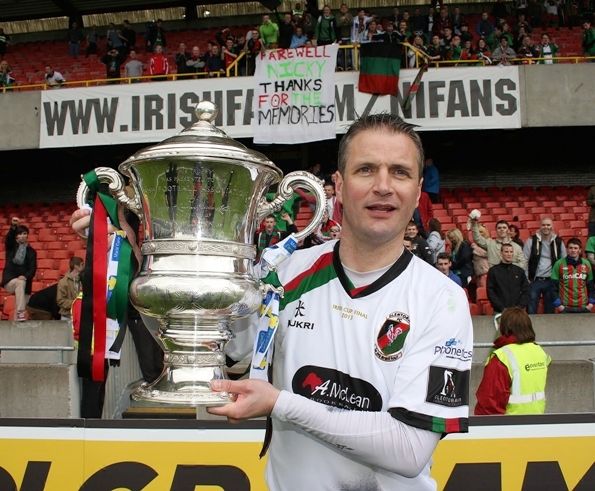 Glentoran's tweet photo. #𝗦𝘁𝗿𝗼𝗻𝗴𝗲𝗿𝗧𝗼𝗴𝗲𝘁𝗵𝗲𝗿 💚

The year is 2013. Eddie Patterson is Glentoran manager and in his first year at the helm it is fair to say he has some fires to fight. 

It's well publicised that due to cash flow issues, Glentoran players have to go a period of time without wages. 

And yet - they still carried on. They trained. They played. They won. Led by Elliott Morris and Colin Nixon, in what would be 'Nicky's' last season at the club, Glentoran reached the Irish Cup Final against treble chasing Cliftonville. 

The Glentoran supporters never stopped supporting. The players playing. The club never stopped believing. 

It was a season in which we re-write the definition of galvanised.

The Irish Cup was won as we proved once again - we are #StrongerTogether 

#COYGlens #StrongerTogether