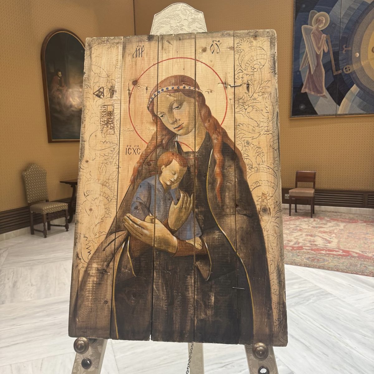 jzipple's tweet image. The icon that Zelensky presented to Pope Leo today, painted on a piece from a munitions crate, is so stunning.
Mary, Queen of Peace, pray for us.