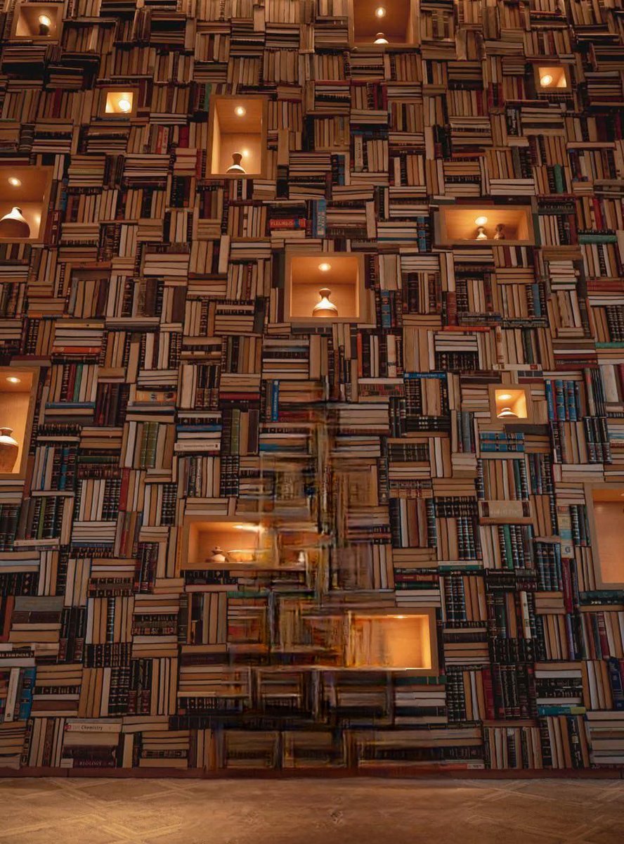 Bookmosis.
The process of falling asleep reading and dreaming about the book.

Good night