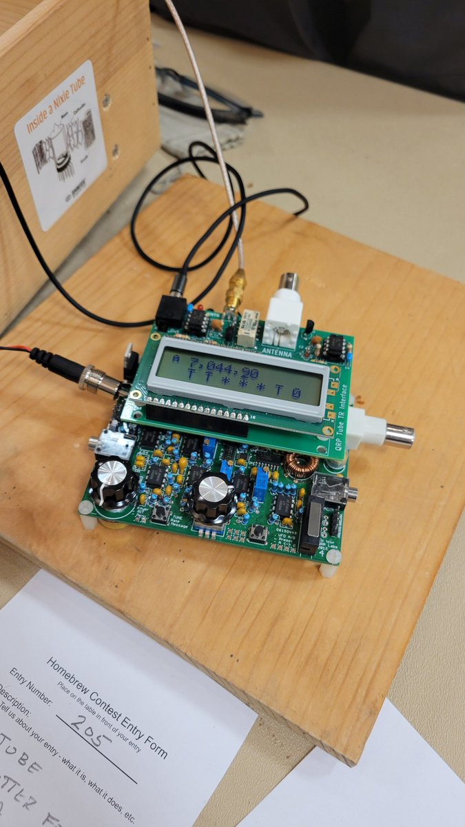 Dan AI6XG wins "best of show" at Four Days in May with his radio containing technology through several decades, which he used on Summits on the Air expeditions. 
#fdim2025 #fourdaysinmay2025 #hamradio #qrp #hamradio #hamr #sota