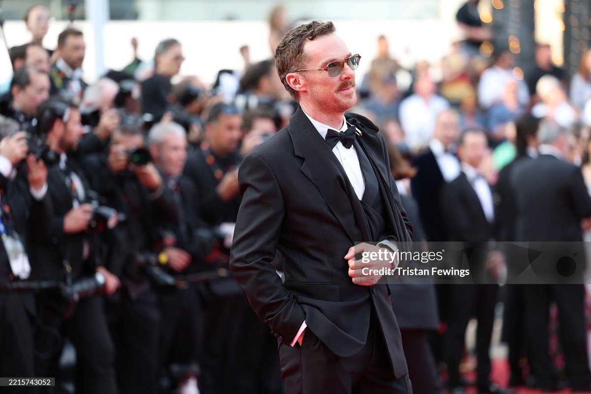 Ayatay221's tweet photo. Benedict Cumberbatch and Sophie Hunter at the "The Phoenician Scheme" red carpet- 78th annual Cannes Film Festival❤️

(What happened to his hand??) https://t.co/si7QV3ce0f