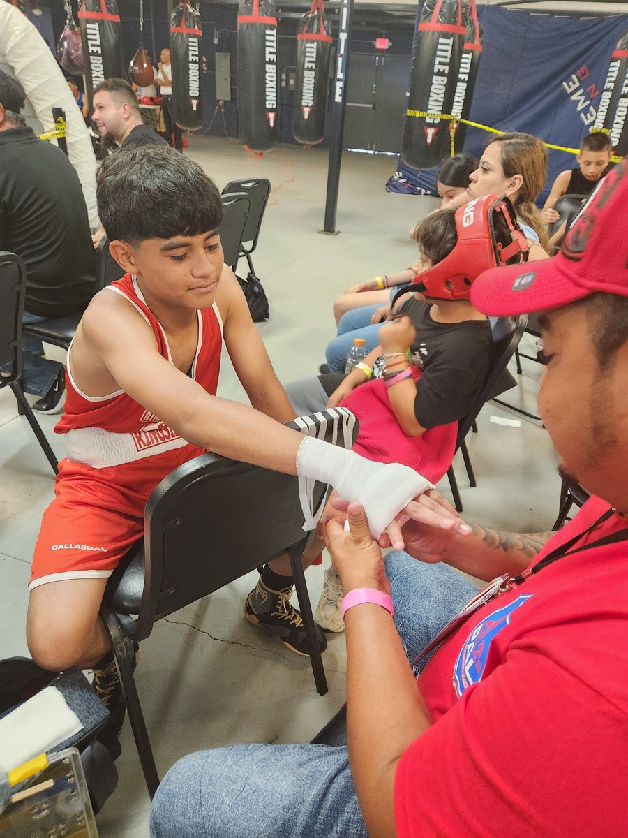 Coach Mares wrapping Eriberto's hands for his bout 16 at Ring of Hope's All Smoke in the South tournament.