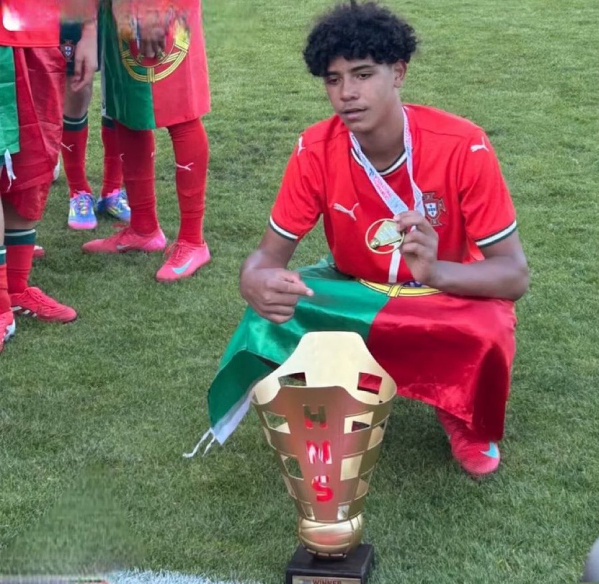 Cristiano Jr with his first trophy for Portugal. ❤️