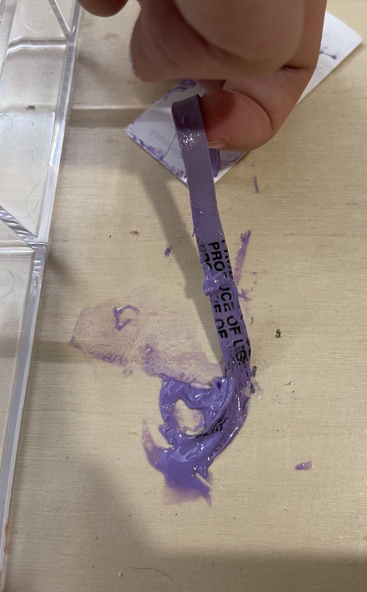 Can someone help me figure out how I somehow managed to (presumably chemically) melt a rubber band in a room-temperature drawer?