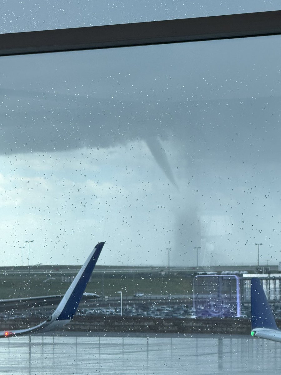 JeremiahOtero's tweet photo. Well, never thought my first tornado sighting would be from the airport but here we are! Pics by @peiweitakeout from Denver International. Not even upset about being delayed now https://t.co/3b2ebbqE1z